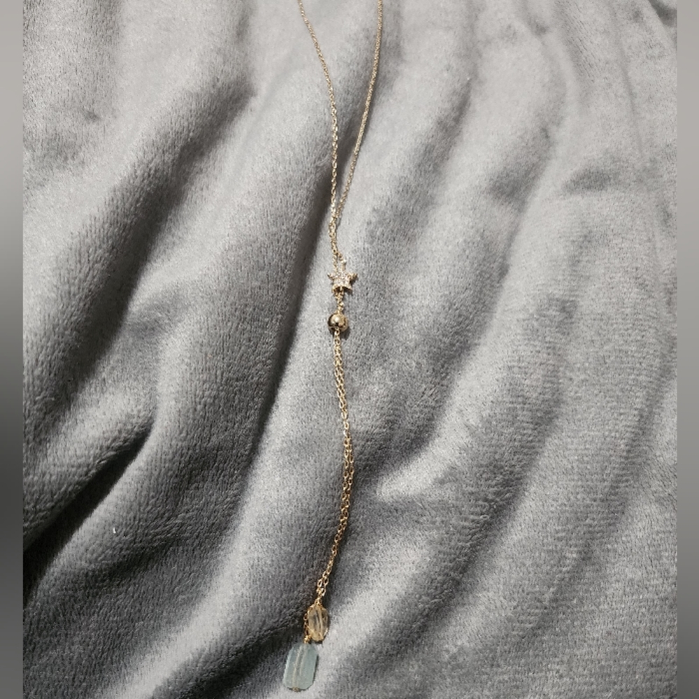 Gold necklace with citrine and jade stone